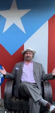 Cartoon moose and frog on a beach
Description automatically generated